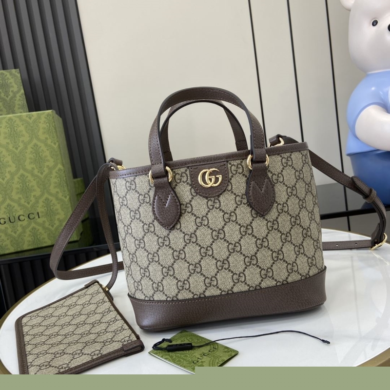 G*u*i shopping bags